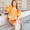 Queen Of Sparkles Orange Peplum Baseball Top