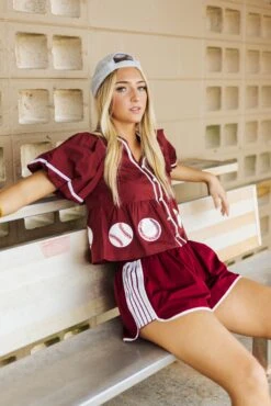 Queen Of Sparkles Maroon Peplum Baseball Top